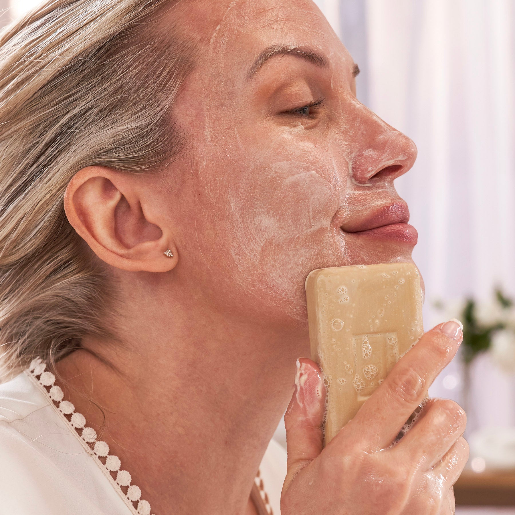 Washing face with Phelityl Cleansing Bar
