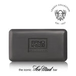 A dark gray rectangular bar of soap with a brushed metal finish, featuring an embossed logo that reads 'ERNO LASZO NEW YORK'. The image includes a 'Legacy Collection Est.